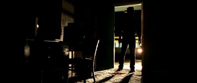 Still from No Country For Old Men (2007) that has been tagged with: night & doorway & wide shot