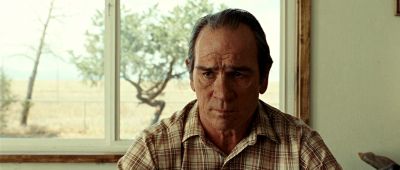 Still from No Country For Old Men (2007) that has been tagged with: 6e1c1c & medium close-up & day & clean single