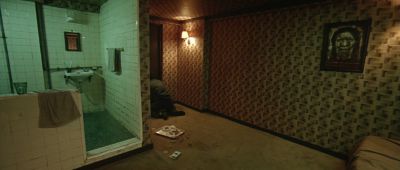 Still from Oldboy (2003) that has been tagged with: interior & wide shot & over-the-shoulder