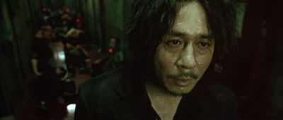 Still from Oldboy (2003) that has been tagged with: group-shot & interior & close-up