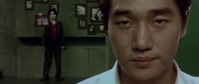 Still from Oldboy (2003) that has been tagged with: 92a3b0 & interior & day & close-up & two-shot
