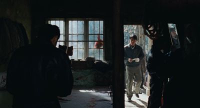 Still from Only the River Flows (2023) that has been tagged with: day & doorway & wide shot