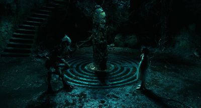 Still from Pan's Labyrinth (2006) that has been tagged with: 004852 & wide shot & two-shot & high-angle & interior