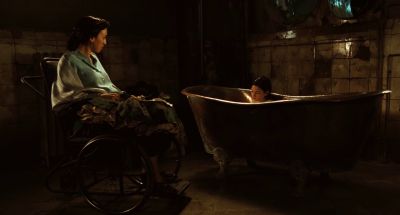 Still from Pan's Labyrinth (2006) that has been tagged with: a67a59 & wide shot & interior & wheelchair