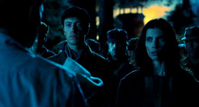 Still from Pan's Labyrinth (2006) that has been tagged with: 0dc1fd & exterior & night & group-shot