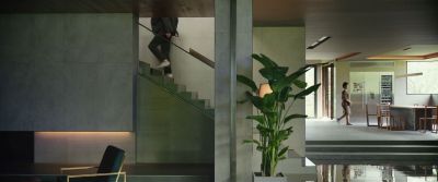 Still from Parasite (2019) that has been tagged with: interior & stairs & profile shot