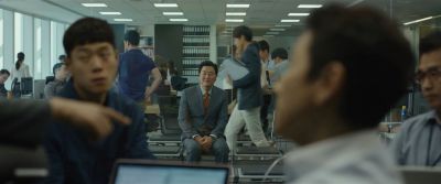 Still from Parasite (2019) that has been tagged with: office & wide shot & day