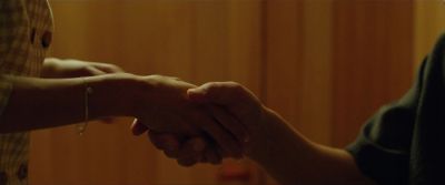 Still from Parasite (2019) that has been tagged with: handshake & insert