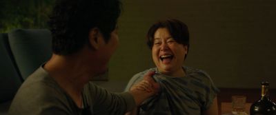 Still from Parasite (2019) that has been tagged with: laughing & night
