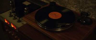 Still from Parasite (2019) that has been tagged with: b7860b & record player