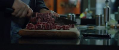Still from Parasite (2019) that has been tagged with: kitchen & cutting & cooking & meat & food & insert