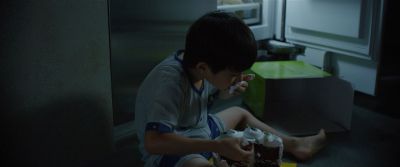 Still from Parasite (2019) that has been tagged with: interior & eating & cake & refrigerator