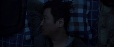 Still from Parasite (2019) that has been tagged with: laying down & bed
