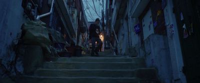 Still from Parasite (2019) that has been tagged with: low-angle & stairs & exterior & wide shot