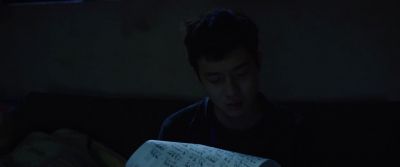 Still from Parasite (2019) that has been tagged with: reading & clean single