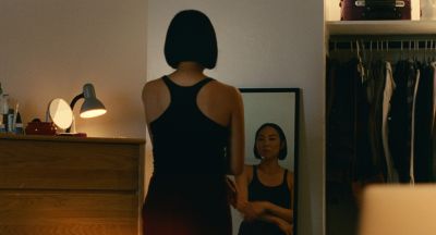 Still from Past Lives (2023) that has been tagged with: night & dressing & mirror