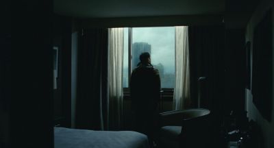 Still from Past Lives (2023) that has been tagged with: interior & wide shot & backlit & day