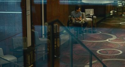 Still from Past Lives (2023) that has been tagged with: day & coffee & interior & wide shot