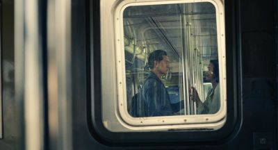 Still from Past Lives (2023) that has been tagged with: subway & day