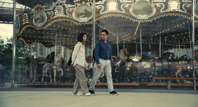 Still from Past Lives (2023) that has been tagged with: amusement park & exterior & wide shot