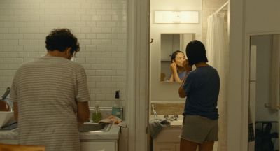 Still from Past Lives (2023) that has been tagged with: bathroom & two-shot & medium wide & interior