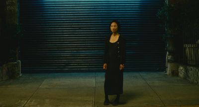 Still from Past Lives (2023) that has been tagged with: night & wide shot & exterior & clean single