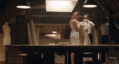 Still from Phantom Thread (2017) that has been tagged with: ab4f53 & two-shot & wide shot & period & interior