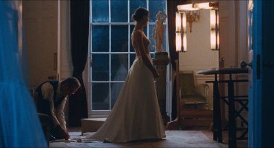 Still from Phantom Thread (2017) that has been tagged with: two-shot & historical & wide shot & night