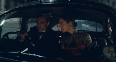 Still from Phantom Thread (2017) that has been tagged with: night & historical & driving & car interior