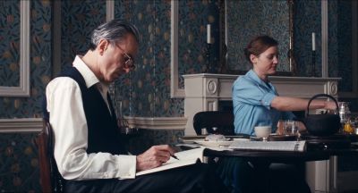 Still from Phantom Thread (2017) that has been tagged with: historical & period & medium wide & two-shot & day