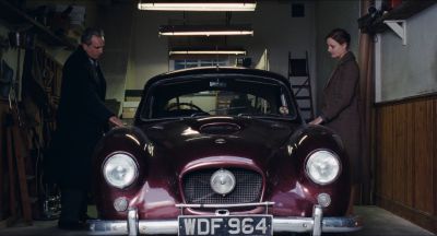 Still from Phantom Thread (2017) that has been tagged with: car & garage