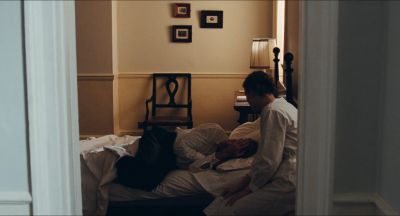 Still from Phantom Thread (2017) that has been tagged with: doorway & bedroom