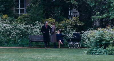 Still from Phantom Thread (2017) that has been tagged with: three-shot & historical & wide shot & day & exterior & stroller