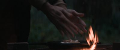 Still from Pig (2021) that has been tagged with: campfire