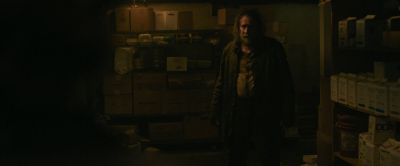Still from Pig (2021) that has been tagged with: storage room & interior & night