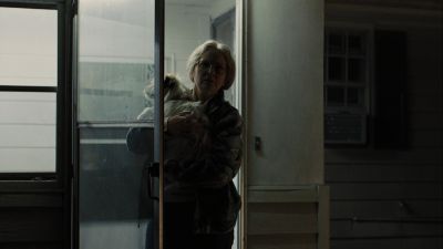 Still from Prisoners (2013) that has been tagged with: doorway & exterior & foyer & dog & clean single & medium wide