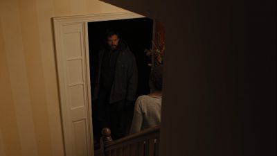 Still from Prisoners (2013) that has been tagged with: over-the-shoulder & doorway & night & high-angle