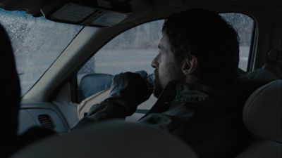 Still from Prisoners (2013) that has been tagged with: car interior & whiskey & drinking