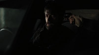 Still from Prisoners (2013) that has been tagged with: car interior & medium shot & gun