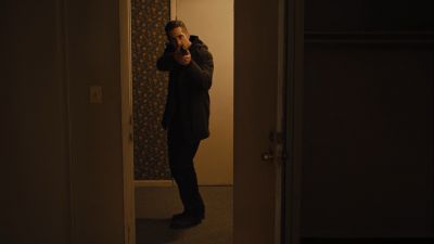 Still from Prisoners (2013) that has been tagged with: doorway & wide shot & gun & night
