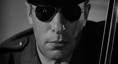 Still from Psycho (1960) that has been tagged with: police & sunglasses