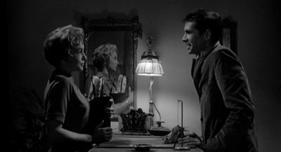 Still from Psycho (1960) that has been tagged with: mirror & two-shot & practical lamp & profile shot