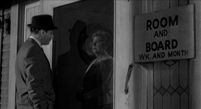 Still from Psycho (1960) that has been tagged with: doorway & sign