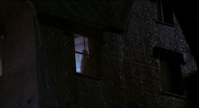Still from Psycho (1998) that has been tagged with: 000000 & night & wide shot & window