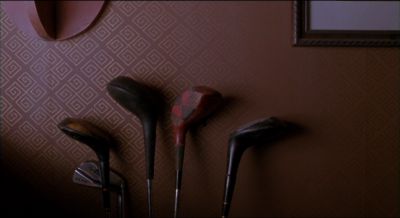 Still from Psycho (1998) that has been tagged with: 000000 & interior & golf clubs & day