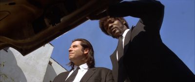 Still from Pulp Fiction (1994) that has been tagged with: medium wide & day & low-angle & two-shot