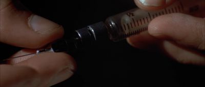 Still from Pulp Fiction (1994) that has been tagged with: extreme close-up & syringe