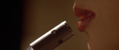 Still from Pulp Fiction (1994) that has been tagged with: lips & extreme close-up