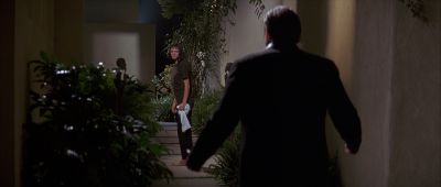 Still from Pulp Fiction (1994) that has been tagged with: wide shot & exterior & night