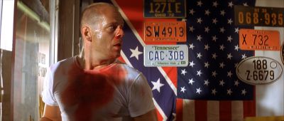 Still from Pulp Fiction (1994) that has been tagged with: medium shot & confederate flag